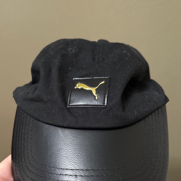 Puma Black Hat with Gold Emblem - Picture 1 of 4
